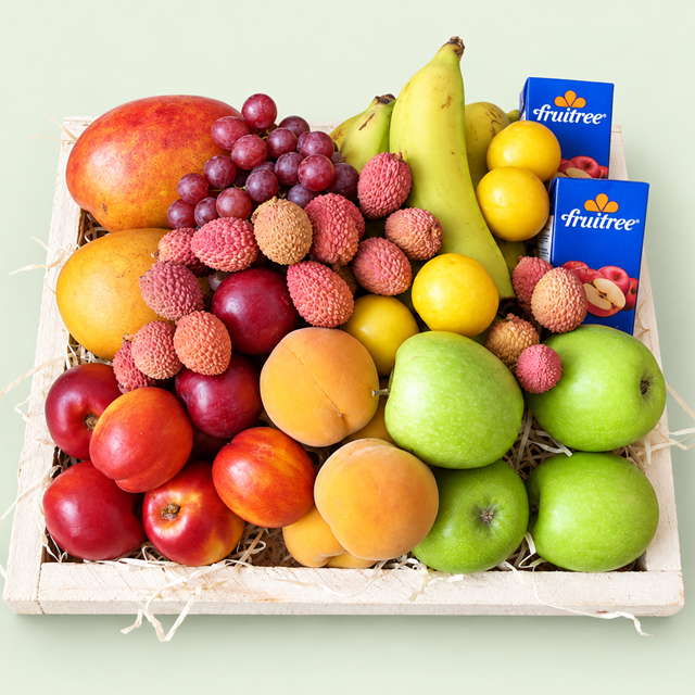 Fresh seasonal fruit and two juice cartons in a wooden gift tray from Eros Florist in Pretoria