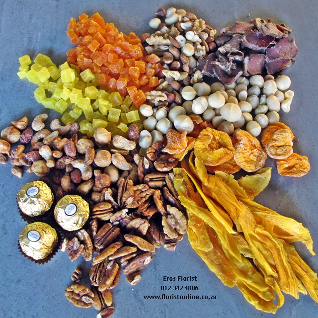Hamper with dried fruits, nuts, chocolates and dried biltong