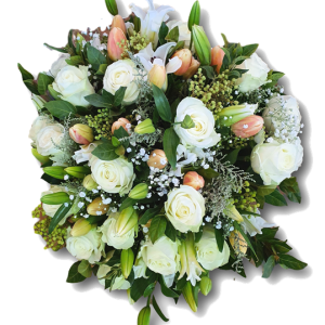 A generous, hand-tied bouquet of fresh seasonal flowers and greenery, beautifully wrapped and available for flower delivery in Pretoria.