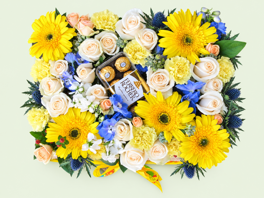 yellow bed of pastel blooms