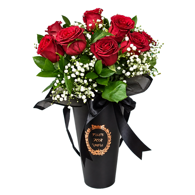 Red roses with filler arranged in a cardboard vase