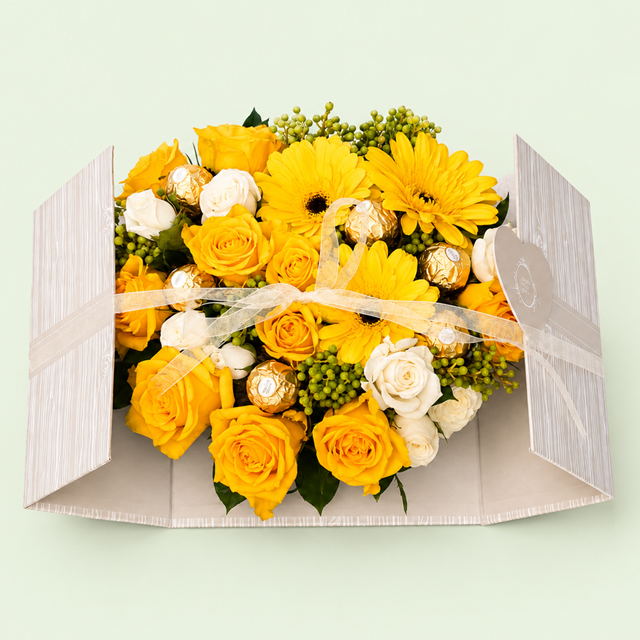 A luxurious combination of fresh flowers and indulgent chocolates, beautifully presented in an elegant gift box. Featuring fresh seasonal blooms, six Ferrero Rocher chocolates and delicate finishing touches,