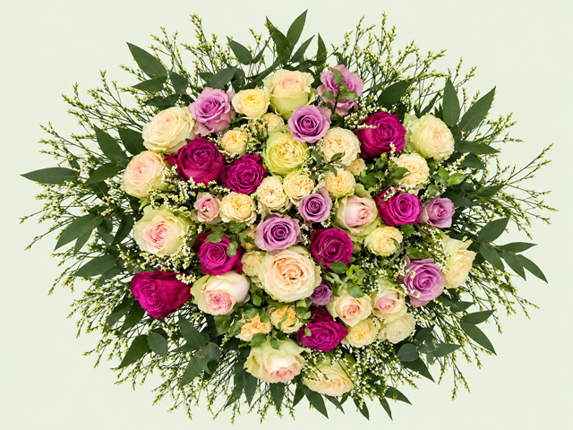 Soft Romance hand-tied bouquet of lilac, cream and pink standard and spray roses with greenery and delicate filler flowers